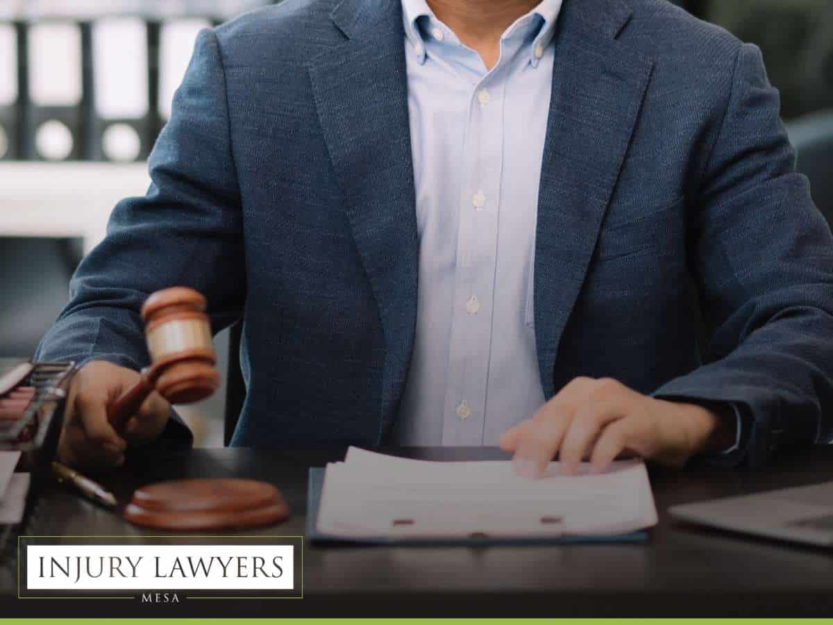 Attorney reviewing documents, highlighting Arizona's rank among states with the most uninsured drivers